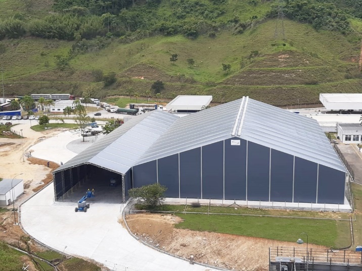 Galpão de alvenaria ou lona para armazenagema